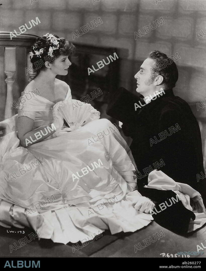 KATHARINE HEPBURN and PAUL LUKAS in LITTLE WOMEN, 1933, directed by GEORGE CUKOR. Copyright RKO.