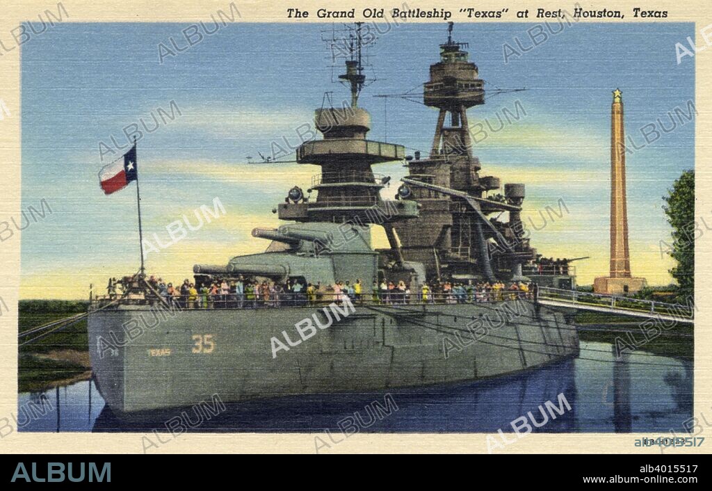 'The grand old battleship 'Texas' at rest, Houston, Texas', USA, 1948. Vintage postcard. Commissioned in 1914, the battleship USS 'Texas' saw action in both World Wars. Since 1947 she has been preserved as a museum ship in the Houston Ship Channel near the San Jacinto Memorial, which can be seen in the background.