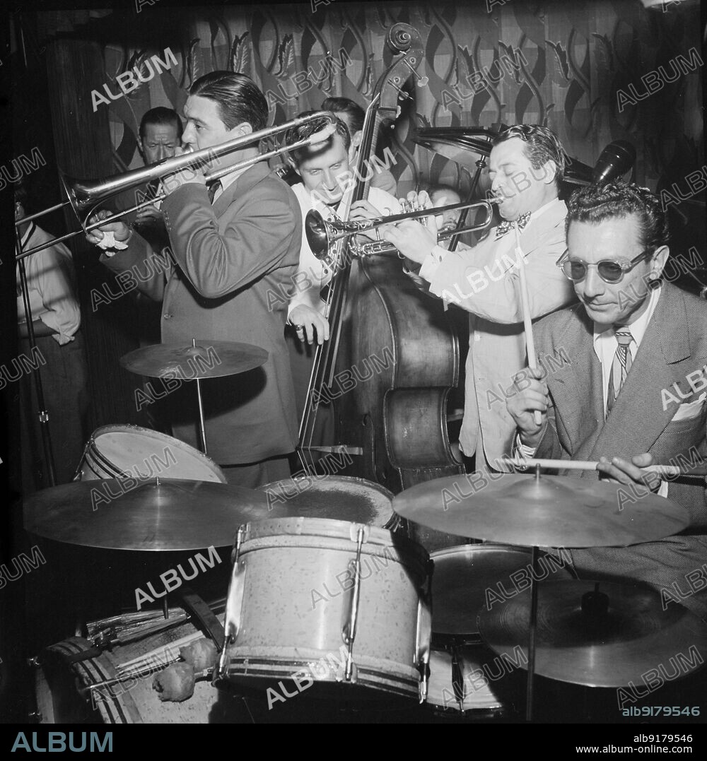 WILLIAM PAUL GOTTLIEB. Portrait of Jack Teagarden, Jack Lesberg, and Max Kaminsky, Famous Door, New York, N.Y., ca. July 1947.