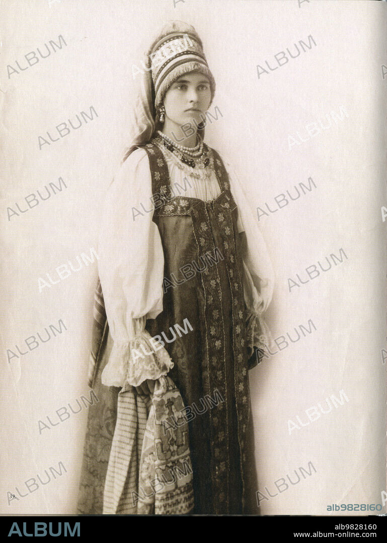 Young Russian woman in traditional folk costume - South Russia, Penza province ca. 1900.