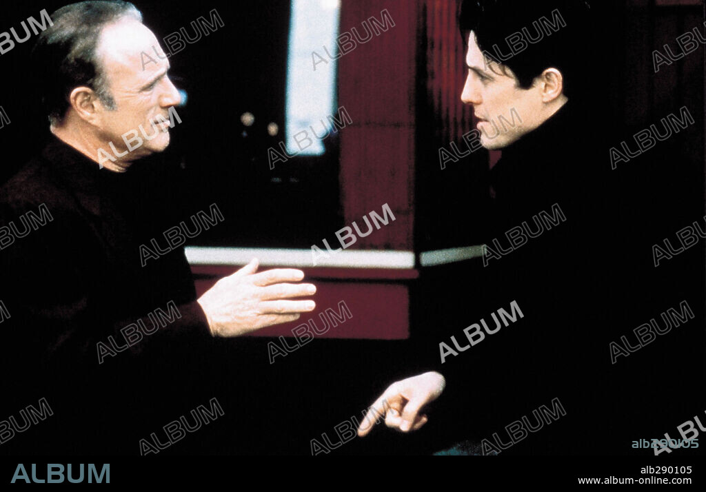 HUGH GRANT and JAMES CAAN in MICKEY BLUE EYES, 1999, directed by KELLY MAKIN. Copyright UNIVERSAL PICTURES.