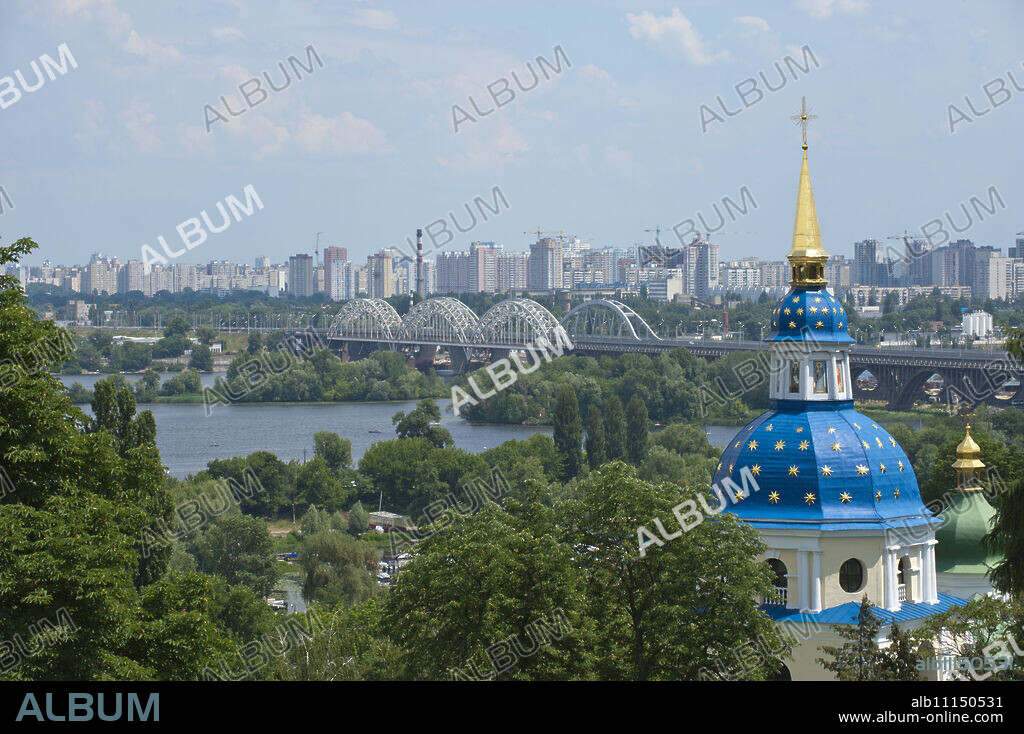 View of Vydubychi Monastery, looking over the Dnipro River to the residential area of Berezniaky, Kiev, Ukraine, Europe.