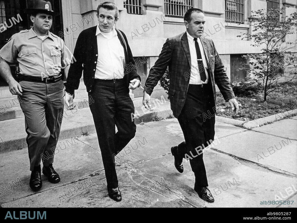 Sheriff Willard Koeppel and undersheriff Richard Diekhoff escort Richard Speck.