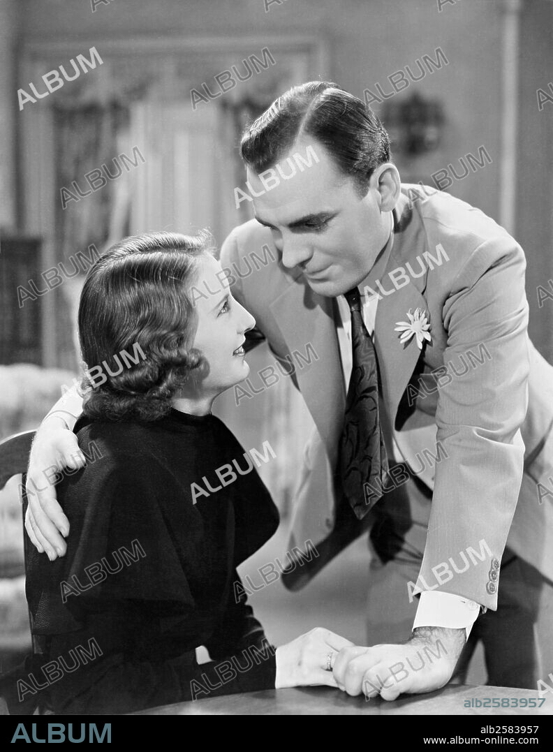 BARBARA STANWYCK and PAT O'BRIEN in GAMBLING LADY, 1934, directed by ARCHIE MAYO. Copyright WARNER BROTHERS.