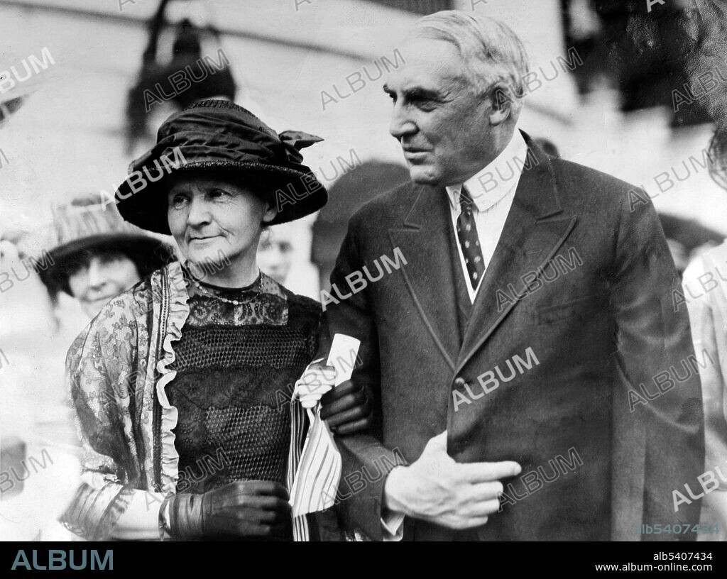 President Harding presents Madame Curie with a gram of radium, May 21, 1921. The gram of radium is a tribute paid her by the women of America and is valued at $100,000. She is seen holding the tube of radium. Marie Curie (November 7, 1867 - July 4, 1934) was a Polish-French physicist and chemist famous for her pioneering research on radioactivity. Curie was the first woman to win a Nobel Prize, the only woman to date to win in two fields, and the only person to win in multiple sciences. Warren Gamaliel Harding (November 2, 1865 - August 2, 1923) was the 29th President of the US (1921-23). International Photo, 1921.