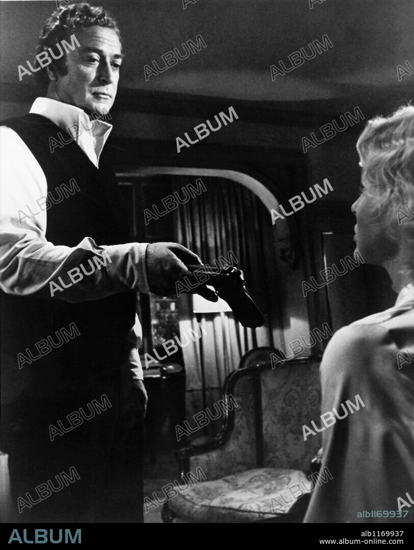 MICHAEL CAINE and VICTORIA TENNANT in THE HOLCROFT COVENANT, 1985, directed by JOHN FRANKENHEIMER. Copyright EMI.