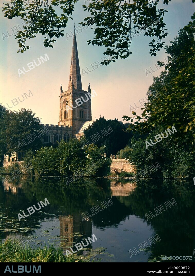 Holy Trinity Church, Stratford on Avon, Warwickshire - The Collegiate Church of the Holy and Undivided Trinity, Stratford-upon-Avon, is often known simply as Shakespeare's Church due to its fame as the place of baptism and burial of William Shakespeare. More than 200,000 tourists visit the church each year. The present building dates from 1210 and is built on the site of a Saxon monastery. It is Stratford's oldest building, in a striking position on the banks of the River Avon, and has long been England's most visited parish church. ©TopFoto.