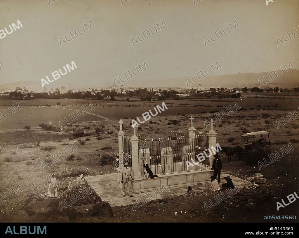 William Henry Jackson, Querétaro, Mexico. Monument to Maximilian von Habsburg, albumin paper, black and white positive process, image size: height: 25 cm; width: 33.6 cm, inscription: verso: in lead: v. Hesse - Wartegg, Geographical Society, in Hamburg, library, travel photography, monument, landscape with plants, city, city view (veduta), group portrait, vehicles covered with animals (carriage etc.), man, woman, dog, horse, standing figure, sitting figure, headgear, hist. Building, location, street, Mexico, With the aim of establishing a monarchy in Mexico dependent on France, the Habsburg Ferdinand Maximilian of Austria (1832-1867) was enthroned as Emperor of Mexico in 1864 at the instigation of Napoleon III. After the withdrawal of the French in 1866, Maximilian could no longer hold on to power. In May 1867, he was captured by the troops of the legitimate government around Benito Juárez in Querétaro and, following a court-martial decision, was shot on June 19, 1867, along with his generals Miguel Miramón and Tomás Mejía. In 1886, a first monument was erected at the place of execution, which the American photographic pioneer William Henry Jackson (1843-1942) captured in pictures during his excursions to Mexico. It consisted of three enclosed stone pillars with the names of the executed. Today, a chapel consecrated in April 1901 commemorates Maximilian at this site.