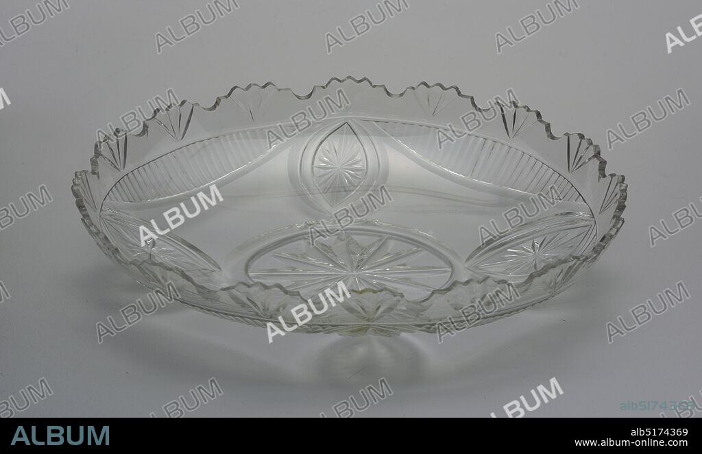 Bowl, Glass, Shallow oval bowl with shaped rim; fan cutting on rim, central oval medallion with four smaller ones surrounding, all cut with stars; 4 swags cut with vertical flutes hang below lip., Ireland, ca. 181015, glasswares, Decorative Arts, Bowl.