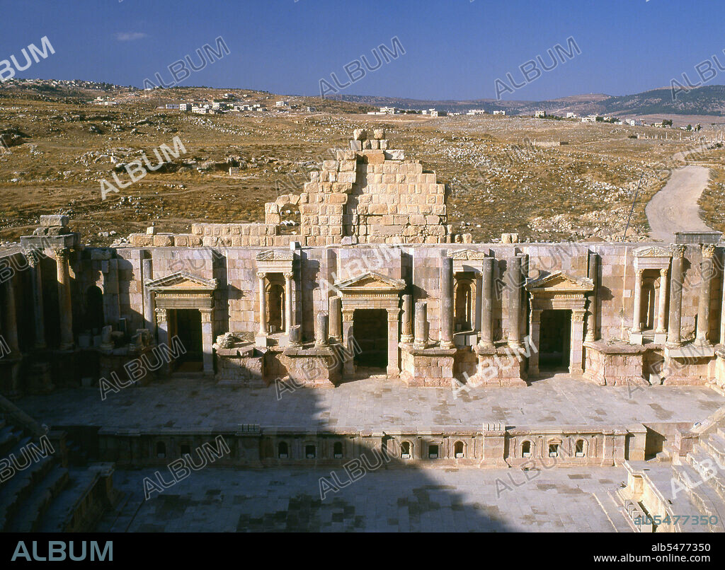 Jerash, is the site of the ruins of the Greco-Roman city of Gerasa, also referred to as Antioch on the Golden River. Jerash is considered one of the most important and best preserved Roman cities in the Near East. It was a city of the Decapolis. Recent excavations show that Jerash was already inhabited during the Bronze Age (3200 BC - 1200 BC). After the Roman conquest in 63 BC, Jerash and the land surrounding it were annexed by the Roman province of Syria, and later joined the Decapolis cities. In AD 90, Jerash was absorbed into the Roman province of Arabia, which included the city of Philadelphia (modern day Amman). The Romans ensured security and peace in this area, which enabled its people to devote their efforts and time to economic development and encouraged civic building activity. In the second half of the first century AD, the city of Jerash achieved great prosperity. In AD 106, the Emperor Trajan constructed roads throughout the provinces and more trade came to Jerash. The Emperor Hadrian visited Jerash in AD 129-130. The triumphal arch (or Arch of Hadrian) was built to celebrate his visit. A remarkable Latin inscription records a religious dedication set up by members of the imperial mounted bodyguard 'wintering' there. The city finally reached a size of about 800,000 square meters within its walls. The Persian invasion in AD 614 caused the rapid decline of Jerash. However, the city continued to flourish during the Umayyad Period, as shown by recent excavations. In AD 749, a major earthquake destroyed much of Jerash and its surroundings. During the period of the Crusades, some of the monuments were converted to fortresses, including the Temple of Artemis. Small settlements continued in Jerash during the Ayyubid, Mameluk and Ottoman periods. Excavation and restoration of Jerash has been almost continuous since the 1920s.