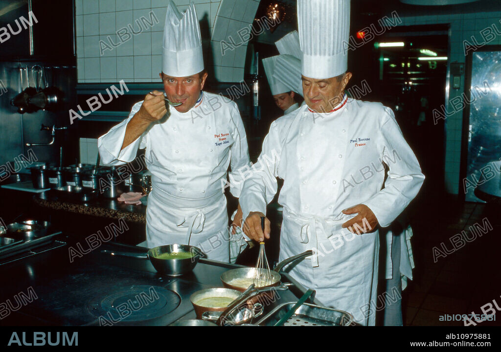 French high quality chef Paul Bocuse (right) with colleague Roger Jaloux in the kitchen of the restaurant at Collonges-au-Mont-d'Or, France 1995.
