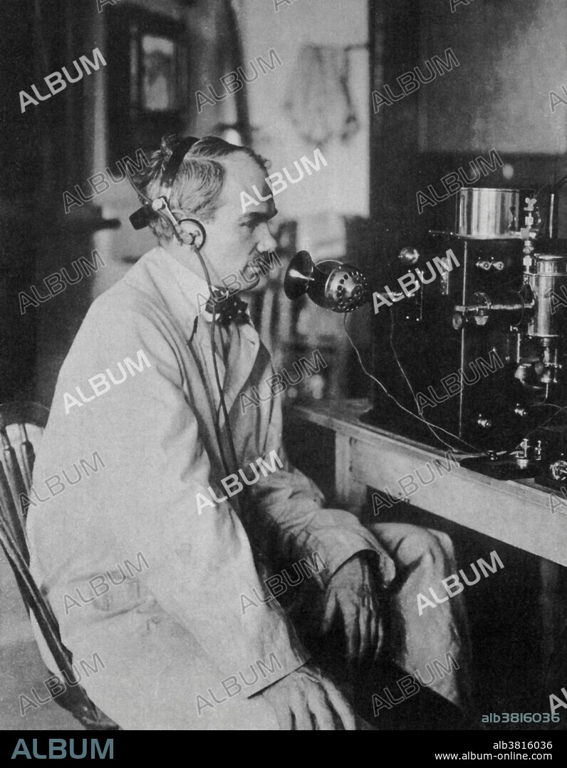 De Forest seated at his invention, the radio-telephone, called the Audion. Lee de Forest (1873-1961) was an American inventor with over 180 patents to his credit. In 1906 De Forest invented the Audion, a vacuum tube that takes relatively weak electrical signals and amplifies them. De Forest is one of the fathers of the "electronic age", as the Audion helped to usher in the widespread use of electronics. He is also credited with one of the principal inventions that brought sound to motion pictures. In 1919, De Forest filed the first patent on his sound-on-film process. Phonofilm recorded sound directly onto film as parallel lines of variable shades of gray, and later became known as a "variable density" system. He was involved in several patent lawsuits and he spent a substantial part of his income from his inventions on the legal bills. He had four marriages and 25 companies. He suffered a severe heart attack in 1958, and remained mostly bedridden until he died in 1961, aged 87.