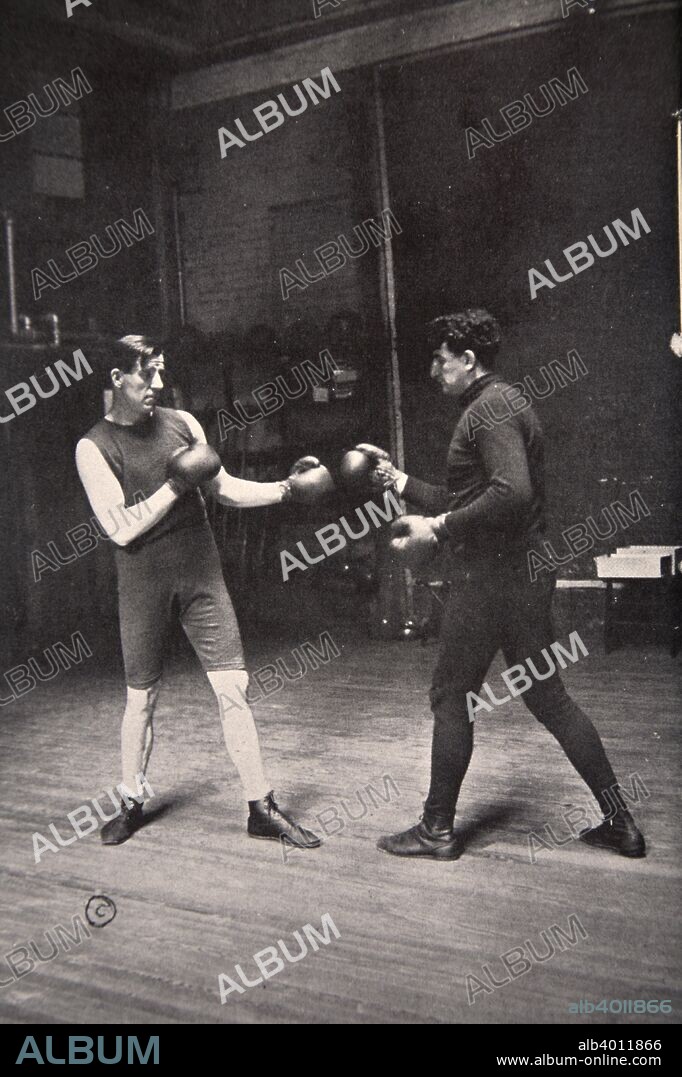 James J Corbett, American boxer, training with Jim Kennedy, 1900. Known as 'Gentleman Jim', James John Corbett (1866-1933) became world heavyweight boxing champion in 1892 when he knocked out John L Sullivan in New Orleans. He succesfully defended his title against Britain's Charley Mitchell in 1894, but retired after losing to another British fighter, Bob Fitzsimmons, in 1897.