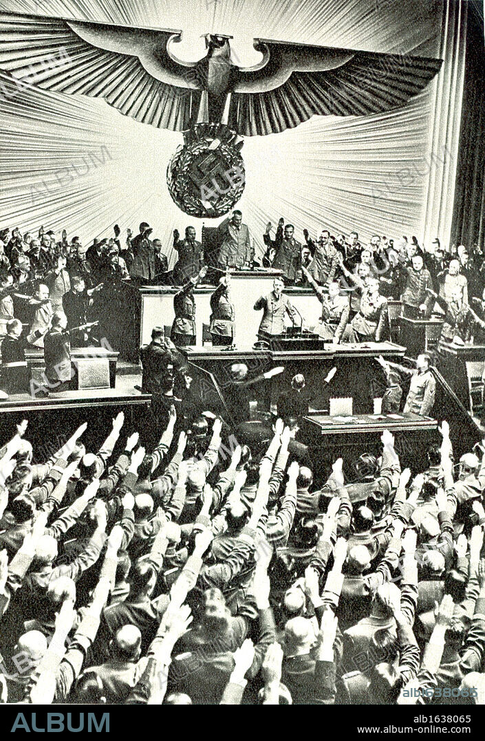 Adolf Hitler addressing a meeting in the Reichstag circa 1935.