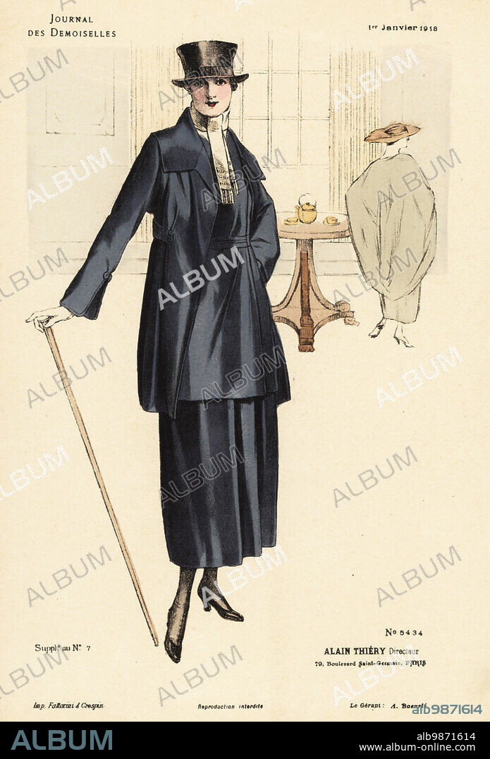 Two fashionable women in a salon, WWI.. Woman in dark blue jacket and matching skirt, with masculine top hat, cravatte and walking stick. Woman in billowing cape behind her. Handcoloured lithograph by Fattorini & Crespin from Alain Thierys fashion magazine Journal des Demoiselles, 79 Boulevard Saint-Germain, Paris, France, January 1, 1918.