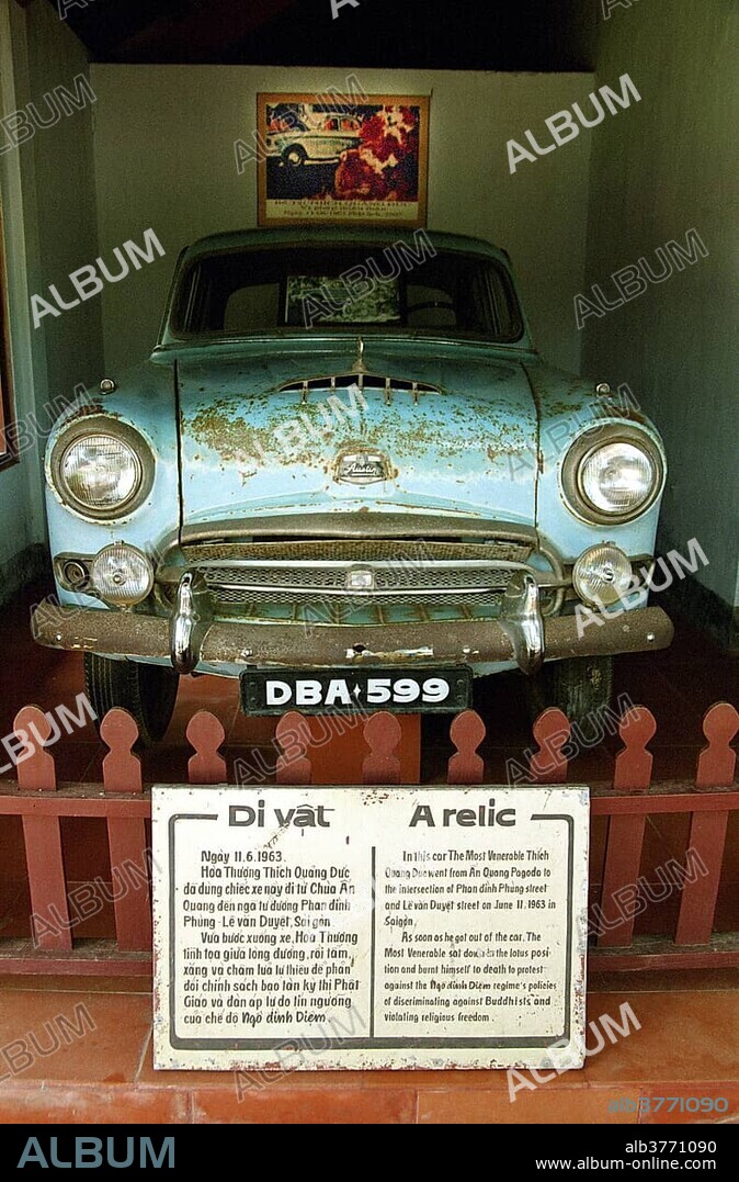 Vintage car of a monk who set himself on fire in protest, the famous photo at the back, from 1963 by Malcolm Browne, shows the Buddhist monk Thích Quảng Đức from Vietnam setting himself on fire to protest against the regime of Ngô Đình Diệm and his oppression of Buddhism, Thien Mu Pagoda, Hue, Vietnam, Southeast Asia