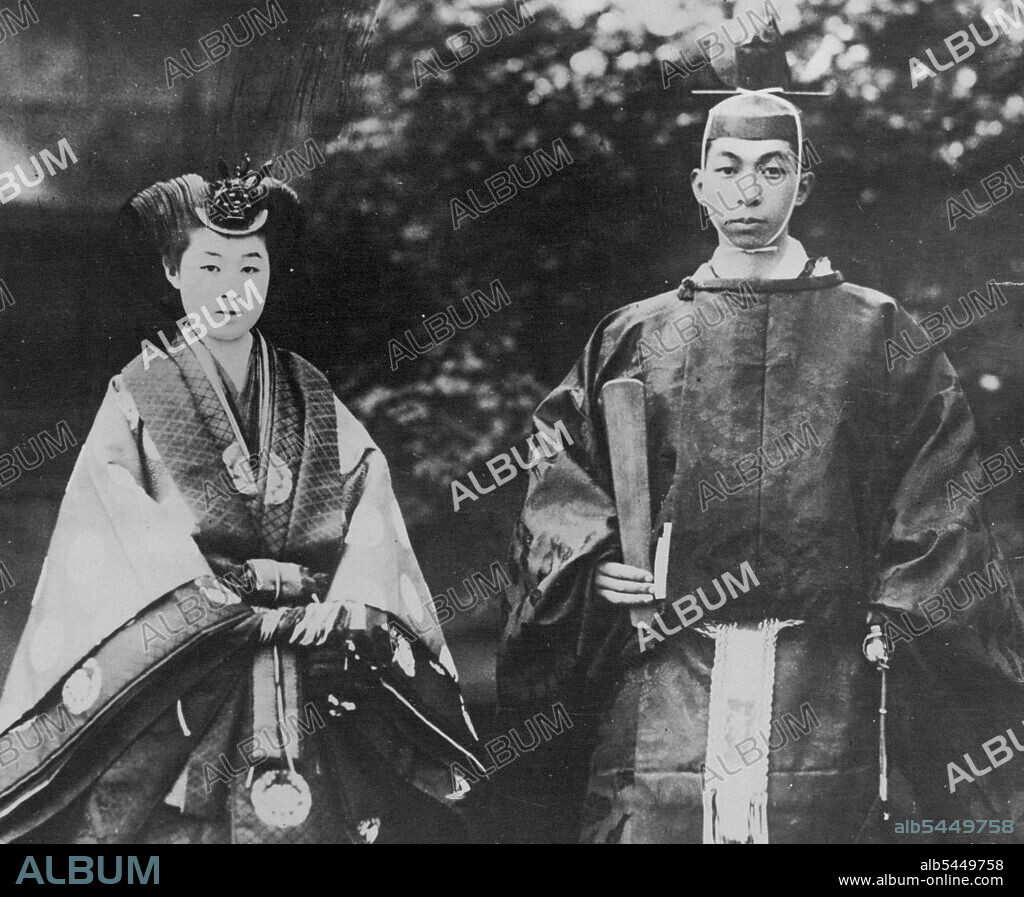 A Royal Bridal Couple - In The Land Of Cherry Blossoms -- His Royal Highness Prince Nobushito Takamatsu, second brother of the Emperor of Japan, with his bride, Miss Kikuko Tokugawa, a descendant of the Soguns. The bride and groom are shown in their State wedding costumes. The ceremony occurred February 4th. February 25, 1930. (Photo by International Newsreel Photo).