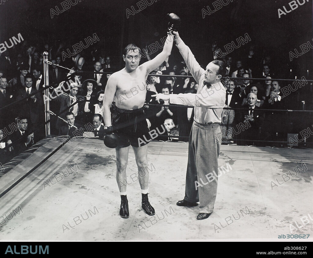 ROBERT MONTGOMERY in HERE COMES MR. JORDAN, 1941, directed by ALEXANDER HALL. Copyright COLUMBIA PICTURES.
