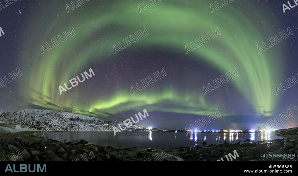 January 7, 2019 - An aurora borealis dances above the Arctic Ocean from Teriberka, Murmansk, Russia.