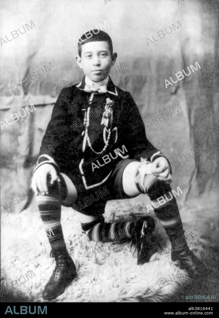 Francesco Lentini (July 8, 1884 - September 22, 1966) was an Italian-American showman. He was born with a parasitic twin. The twin was attached to Lentini's body at the base of his spine and consisted of a pelvis bone, a rudimentary set of male genitalia and a full-sized leg extending from the right side of Lentini's hip, with a small foot protruding from its knee. At the age of 8, his family moved to the United States, where he entered the sideshow business as The Great Lentini. He gained US citizenship at the age of 30. His career spanned over 40 years and he worked with every major circus and sideshow including Barnum and Bailey and Buffalo Bill's Wild West Show. Lentini was so respected among his peers that he was often called "The King". In his youth, Lentini used his third leg to kick a football across the stage, creating his stage name, the Three-Legged Football Player. While his extra leg was several inches shorter than the others, his primary legs were also two different lengths. He was heard to complain that even with three legs, he still didn't have a pair. He married Theresa Murray and they had four children. He died of lung failure in 1966 at the age of 82. Edena Company, 1901.