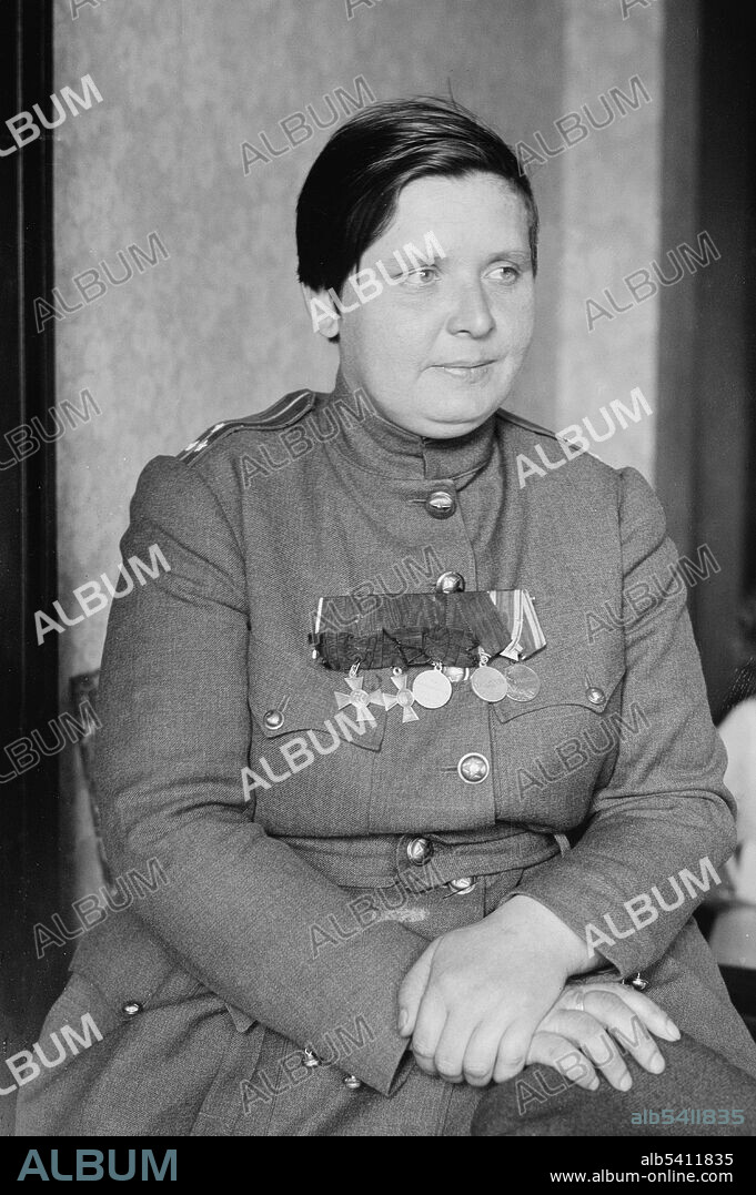 Maria Bochkareva visiting New York City. Maria Leontievna Bochkareva (1889 - May 16,1920) was a Russian soldier. At the outbreak of WWI, she joined the army by securing the personal permission of Tsar Nicholas II. She began front-line duty with the 5th Corps, 28th Regiment of the Second Army. She was decorated for rescuing 50 wounded soldiers from the field. After she was wounded in the arm and leg, Bochkareva worked as a medical sister until she returned to the front as a corporal in charge of 11 men. She suffered another injury that left her paralyzed for 4 months. After she recovered, she returned to the front as a senior non-commissioned officer delivering supplies. She was discharged in the spring of 1917. After the abdication of the Tsar, she proposed to Mikhail Rodzianko the creation of an all-female combat unit that she claimed would fix the Army's morale problem. Although female recruitment went against army regulations, the all-female battalion was granted special dispensation and designated the 1st Russian Women's Battalion of Death. Her unit was at the front at the time of the October Revolution. In 1919, she attempted to form a women's medical detachment under White Army Admiral Aleksandr Kolchak, but she was captured by the Bolsheviks. She was sentenced to death and executed as an enemy of the working class on May 16, 1920. Bain News Service, 1918.