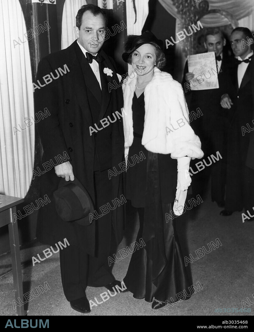 MACARTHUR & HAYES, 1934.American journalist and playwright Charles MacArthur and his wife, actress Helen Hayes, at the premiere of the film, 'The Merry Widow,' 1934.