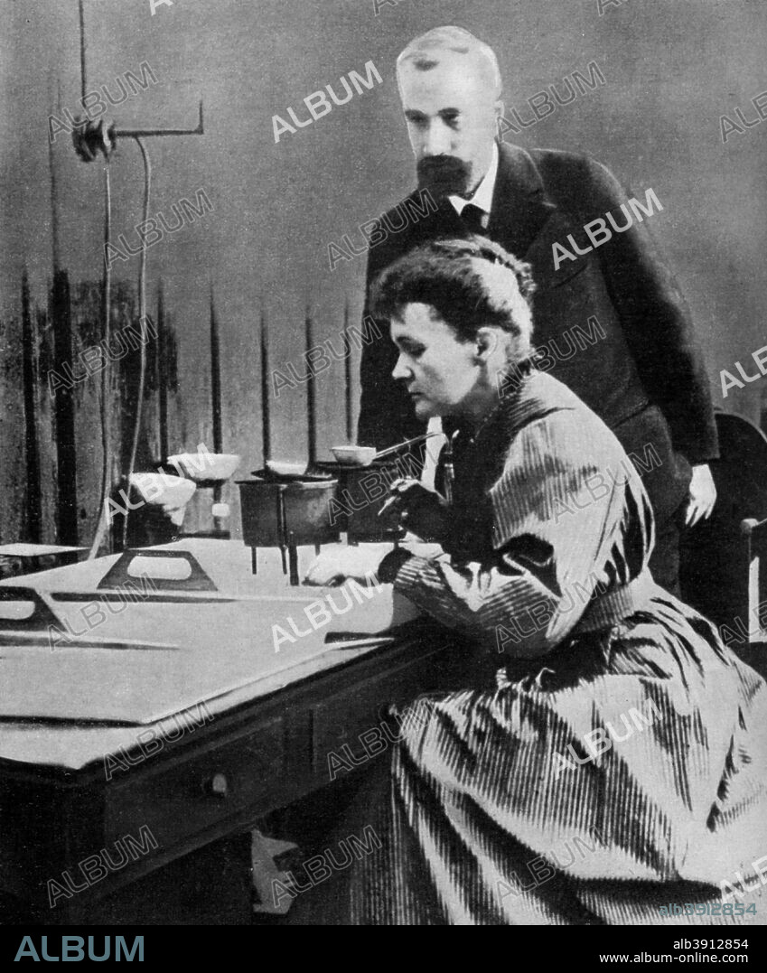 Pierre and Marie Curie in their laboratory. 1898, (1951). Polish-born Marie Curie and her husband Pierre continued the work on radioactivity started by Henri Becquerel. In 1898, they discovered two new elements, polonium and radium. Marie did most of the work of producing these elements, and to this day her notebooks are still too radioactive to use. She went on to become the first woman to be awarded a doctorate in France, and continued her work after Pierre's death in 1906. In 1903 they shared the Nobel Prize for Physics with Becquerel. A print from 100 Years in Pictures, A panorama of History in the Making, text by DC Somervell, Odhams press Limited, London, 1951.