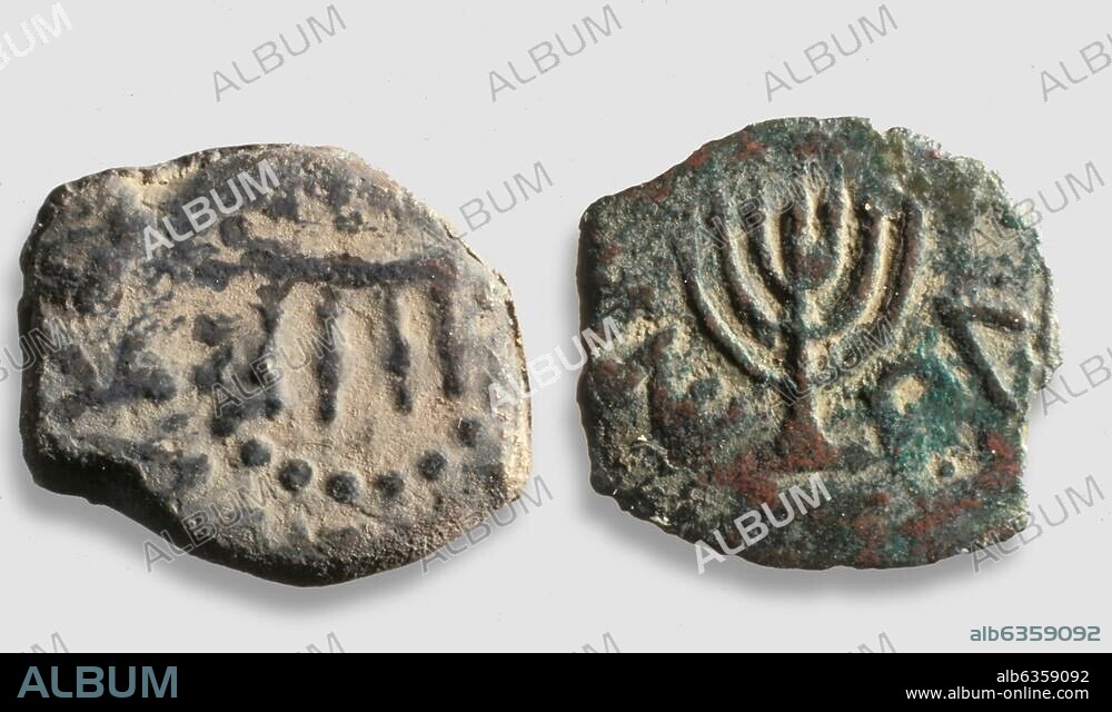 603. COIN OF MATTITYAH ANTIGONOS, 40-37 B.C. DEPICTING THE SEVEN BRANCHED CANDELABRA (MENORAH), INSCRIBED (IN GREEK): ' MATTITYAH THE GREAT PRIEST'. ON OBVERSE THE SHOWBREAD TABLE USED IN THE TEMPLE IS DEPICTED.