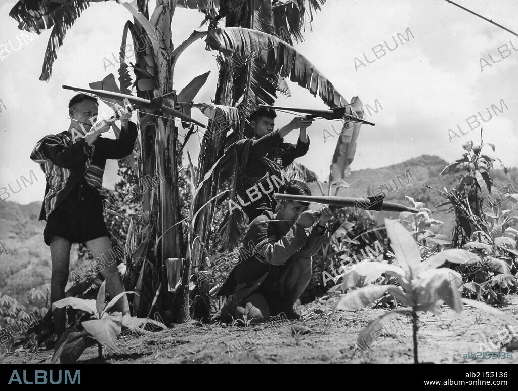 Communist guerrillas armed with cross-bows and poison-tipped arrows. South Vietnam. Vietnam War. 1965. (Photo by: Sovfoto/UIG via Getty Images).