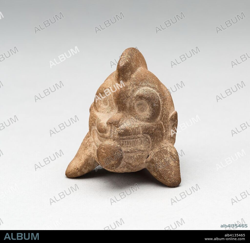 MAYA. Whistle in the Form of the Head of a Jaguar. Possibly Jaina-style; Possibly Campeche, Mexico. Date: 250 AD-900 AD. Dimensions: . Ceramic and pigment. Origin: Campeche.