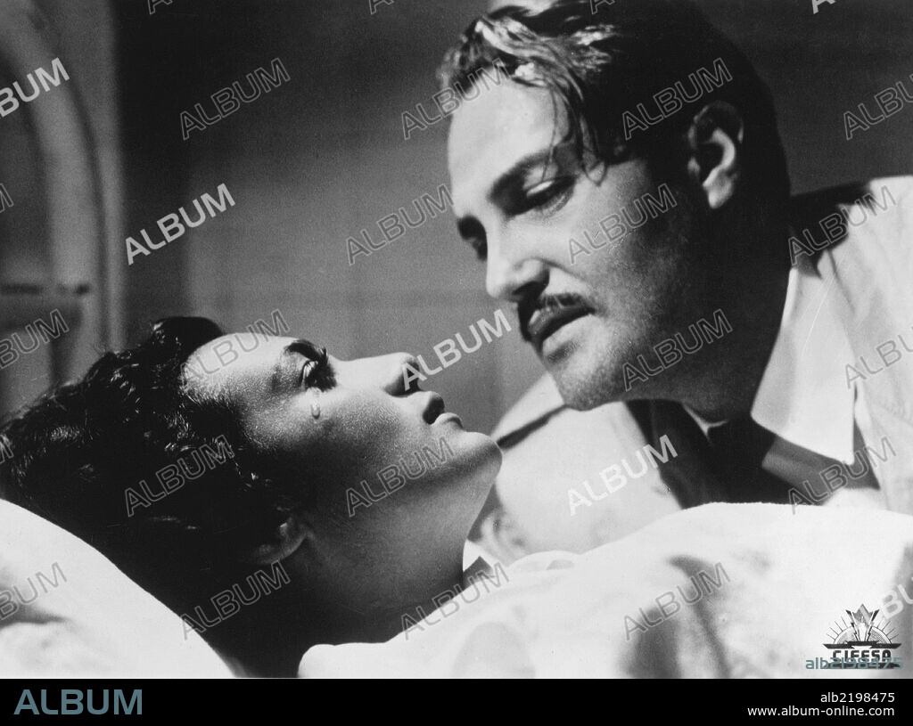 ARTURO DE CORDOVA and MARIA FELIX in REPORTAJE, 1953, directed by EMILIO FERNANDEZ. Copyright CLASA-MOHME INC.