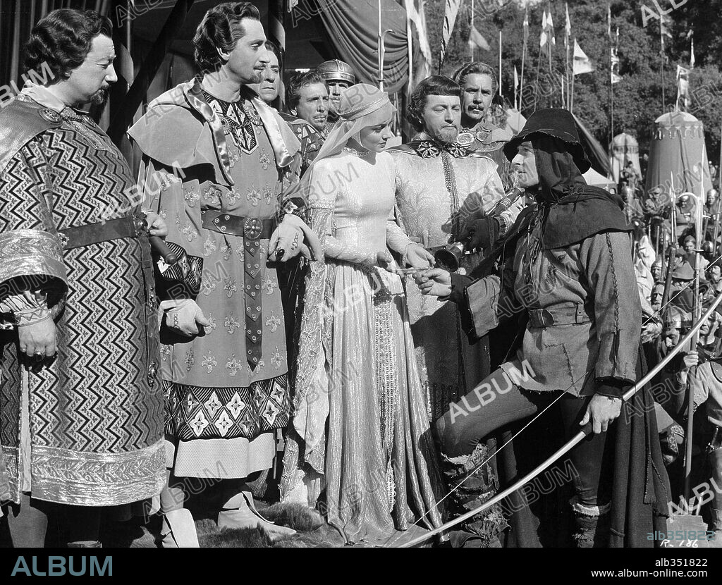 BASIL RATHBONE, CLAUDE RAINS, ERROL FLYNN, MELVILLE COOPER and OLIVIA DE HAVILLAND in THE ADVENTURES OF ROBIN HOOD, 1938, directed by MICHAEL CURTIZ and WILLIAM KEIGHLEY. Copyright WARNER BROTHERS.