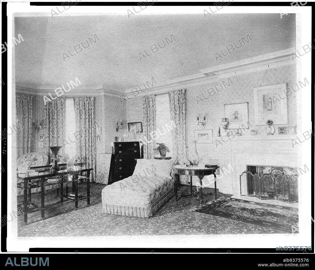 FRANCES BENJAMIN JOHNSTON. Bedroom with fireplace, and padded chaise longue, in home of Edmund Cogswell Converse, Greenwich, Connecticut, 1908. The Conyers Farm estate, designed by Donn Barber c1904, was owned by businessman Edmund C. Converse.
