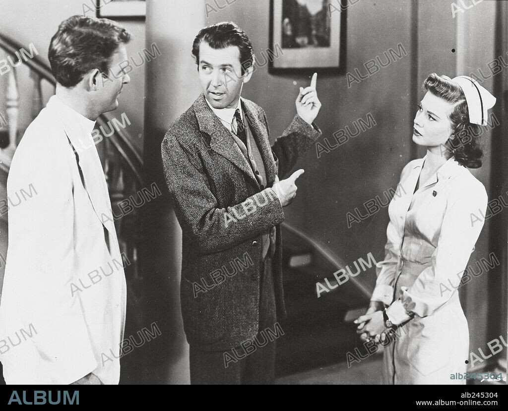 CHARLES DRAKE, JAMES STEWART and PEGGY DOW in HARVEY, 1950, directed by HENRY KOSTER. Copyright UNIVERSAL PICTURES.