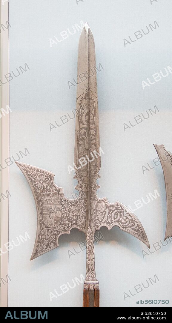 Halberd of Prince Karl Eusebius of Liechtenstein (1611-1684). Culture: German. Dimensions: L. 90 5/8 in. (230.17 cm); L. of head (excluding straps) 24 1/2 in. (62.23 cm); W. 11 5/16 in. (28.73 cm); Wt. 7 lb. 7 oz. (3374 g). Date: dated 1632.