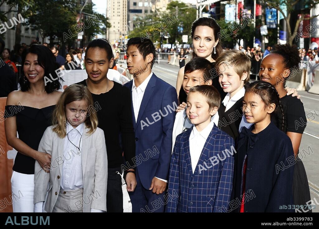 ANGELINA JOLIE, MADDOX JOLIE-PITT, PAX JOLIE-PITT, SHILOH NOUVEL JOLIE-PITT and ZAHARA JOLIE-PITT. September 11, 2017 - Toronto, Ontario, Canada - Loung Ung, Vivienne Marcheline Jolie-Pitt, Maddox Jolie-Pitt, Pax Thien Jolie-Pitt, Kimhak Mun, Knox Leon Jolie-Pitt, Shiloh Jolie-Pitt, Angelina Jolie, Zahara Jolie-Pitt and Sareum Srey Moch attending the 'First They Killed My Father: A Daughter of Cambodia Remembers' premiere during the 42nd Toronto International Film Festival at Princess of Wales Theatre on September 11, 2017 in Toronto, Canada. 11/09/2017