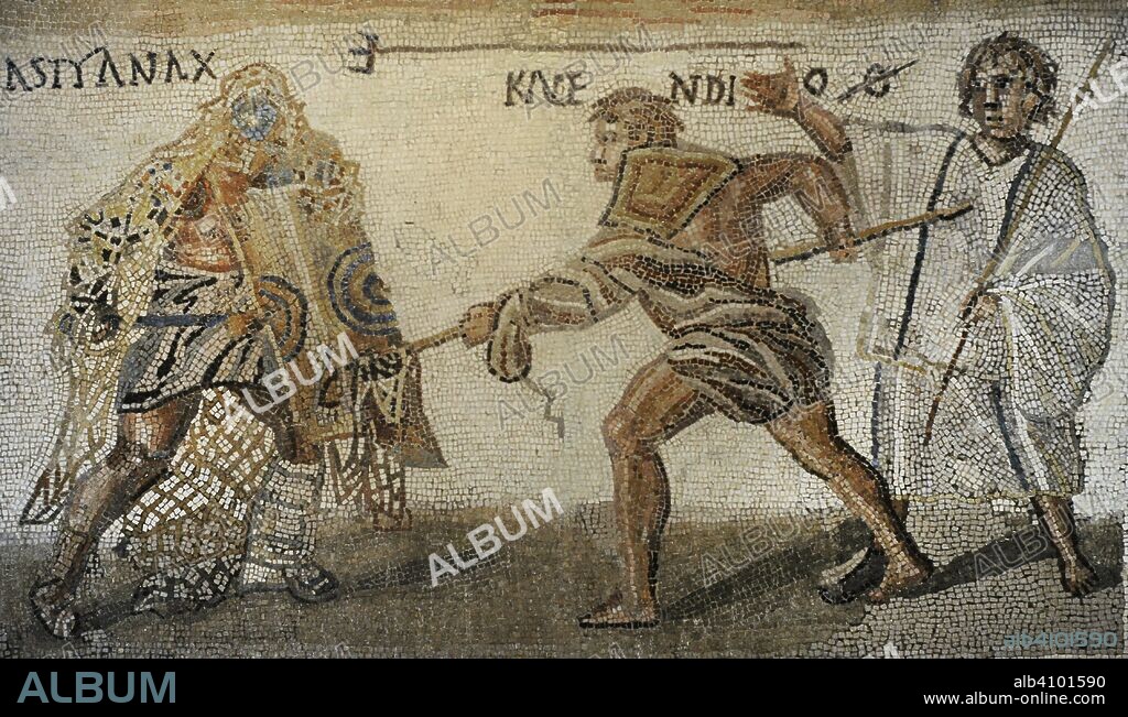 Roman mosaic. Limestones. Secutor versus retiarius. Depiction of the mortal combat between the secutor Astyanax and the retiarius Kalendio. The lanista (gladiator trainer) encourages the combat. Detail of the lower mosaic scene. 3rd century AD. From Rome (Italy). National Archaeological Museum. Madrid. Spain.