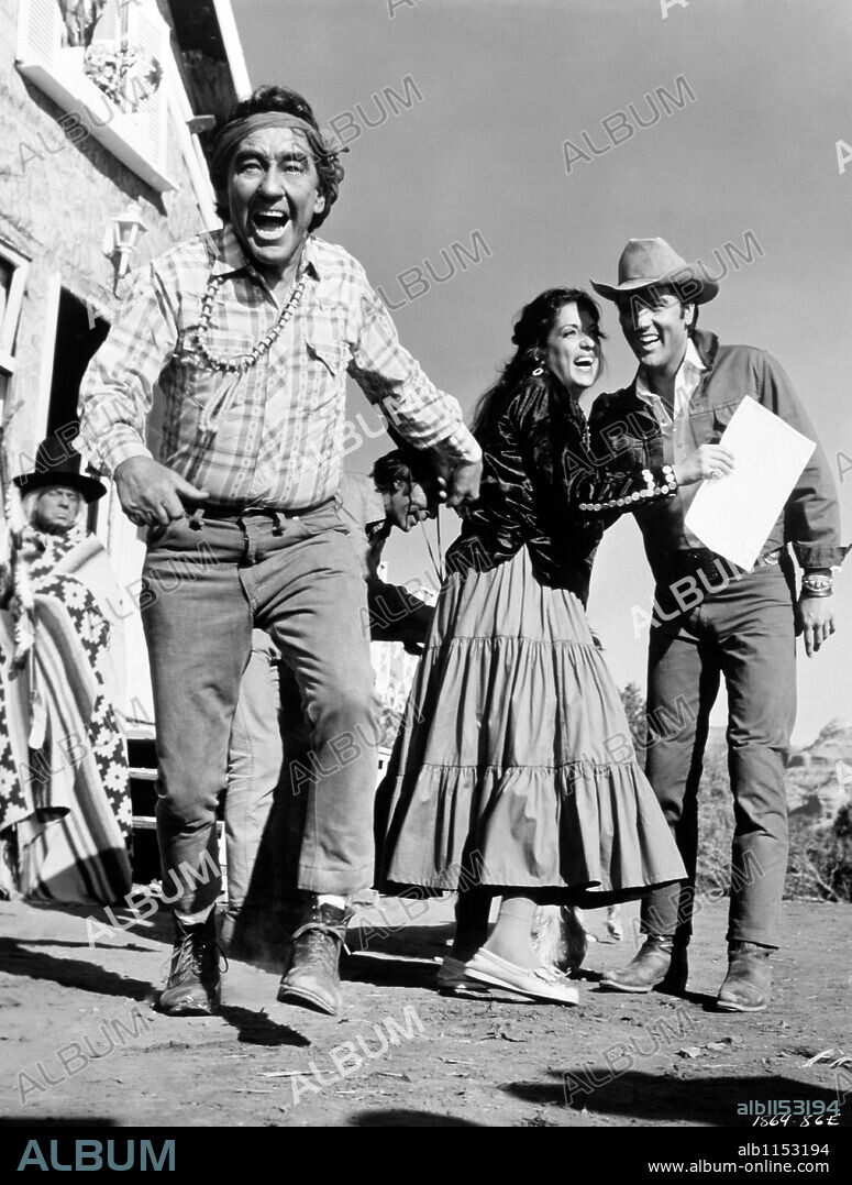 BURGESS MEREDITH and ELVIS PRESLEY in STAY AWAY, JOE, 1968, directed by PETER TEWKSBURY. Copyright M.G.M.