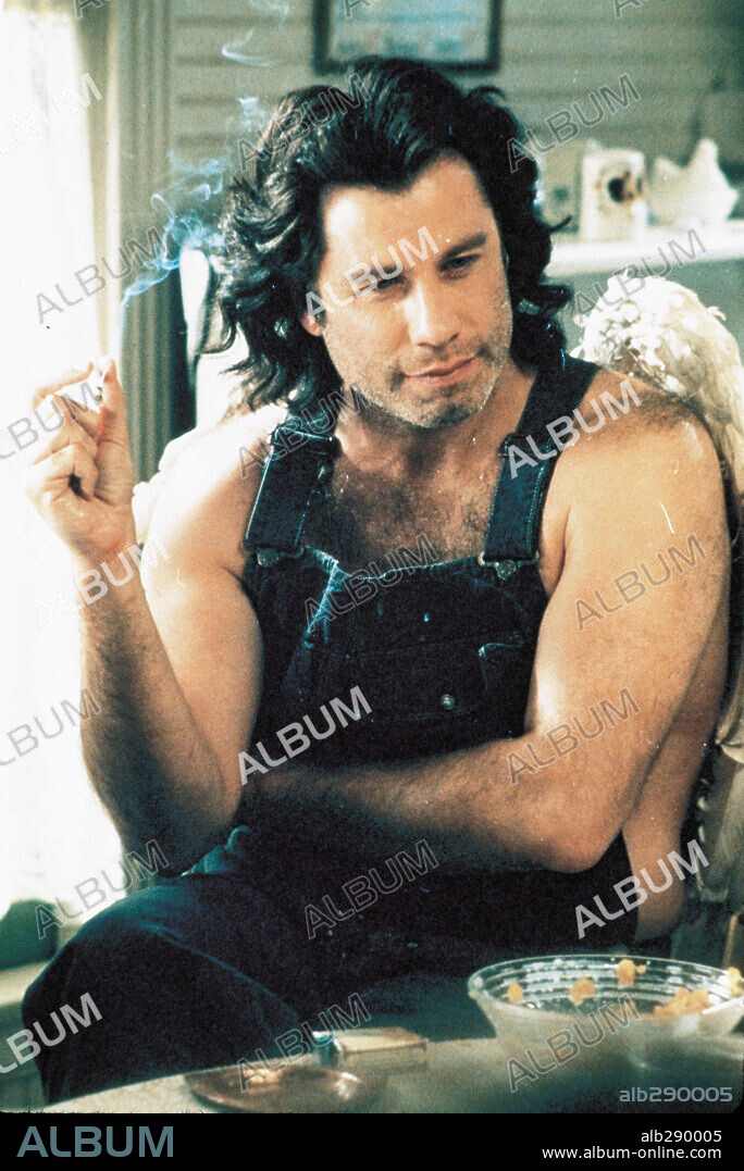 TRAVOLTA JOHN. JOHN TRAVOLTA en MICHAEL, 1996, dirigida por NORA EPHRON. Copyright ALPHAVILLE/NEW LINE CINEMA/TURNER PICTURES.