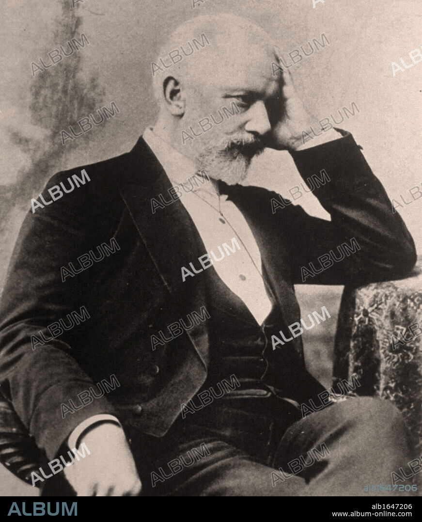 Peter Ilich Tchaikovsky (1840-1893) Russian composer. Tchaikovsky seated in chair, elbow on table, head on hand.    Portrait Music Romantic Musician.