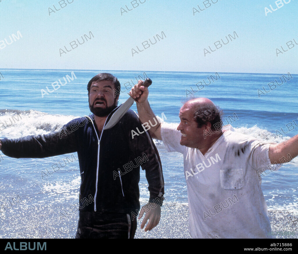 BURT REYNOLDS and DOM DELOUISE in THE END, 1978, directed by BURT REYNOLDS. Copyright UNITED ARTISTS.