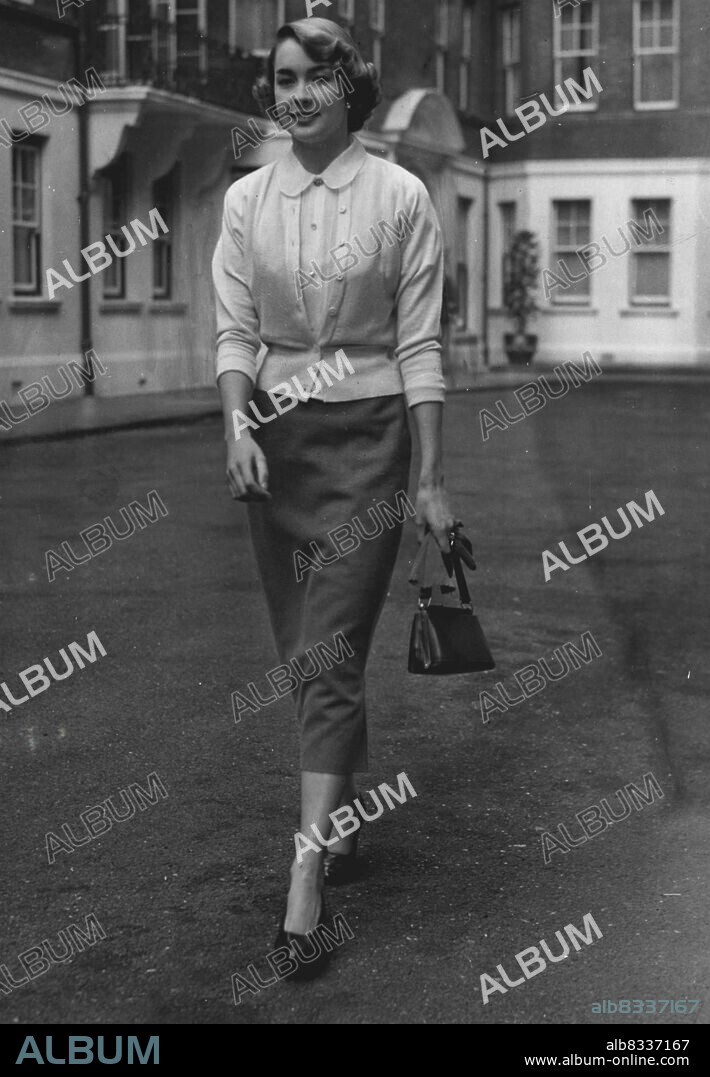 The girl who will marry Lord Dalkeith to Day's picture Strolling in London today was 22 years-old Miss Jane McNeill, who as engagement to the Earl of Dalkeith friend of Princess Margaret, is announced to-day. Miss McNeill is the daughter of Mr John McNeill, Q.C., and Mrs McNeill, of Appir. Argyll. The couple have known each other for about four years. Lord Dalkeith, 28, is the only son and heir of the Duke and Duchess of Buccleuch. August 6, 1952.