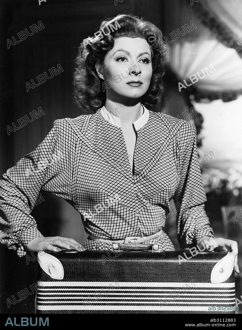 GREER GARSON in MRS MINIVER, 1942 (MRS. MINIVER), directed by WILLIAM WYLER. Copyright M.G.M.