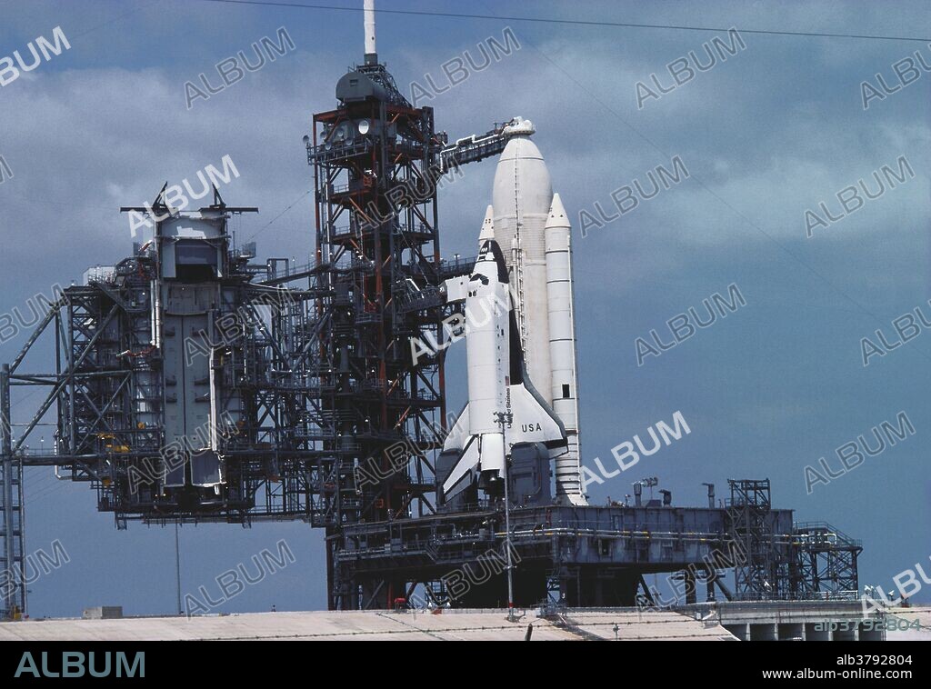 The Space Shuttle Columbia sits on the launch pad; April 1981.  STS-1 was the first orbital flight of the Space Shuttle.