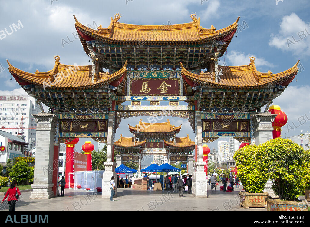 The Jinma Biji or Golden Horse Jade Rooster archways stand at the heart of commercial Kunming. The golden horse and the green chicken (rooster) are symbols of the city of Kunming and appear in its emblem. Built on the banks of Lake Dian and surrounded by limestone mountains, Kunming was an important ancient trade route between Tibet, China and Southeast Asia. The city, then called Yunnanfu, suffered at the hands of rebel leader Du Wenxiu, the Sultan of Dali, who attacked and besieged the city several times between 1858 and 1868, razing most of the city's Buddhist temples. In the 1890s, an uprising against working conditions on the Kunming-Haiphong railway line saw 300,000 laborers executed after France shipped in weapons to suppress the revolt. The railway line, only completed in 1911, was built by the French so that they could tap Yunnan's mineral resources for their colonies in Indochina. Today, Kunming is a city of over 6 million people, and is the political, economic, communications and cultural centre of Yunnan.
