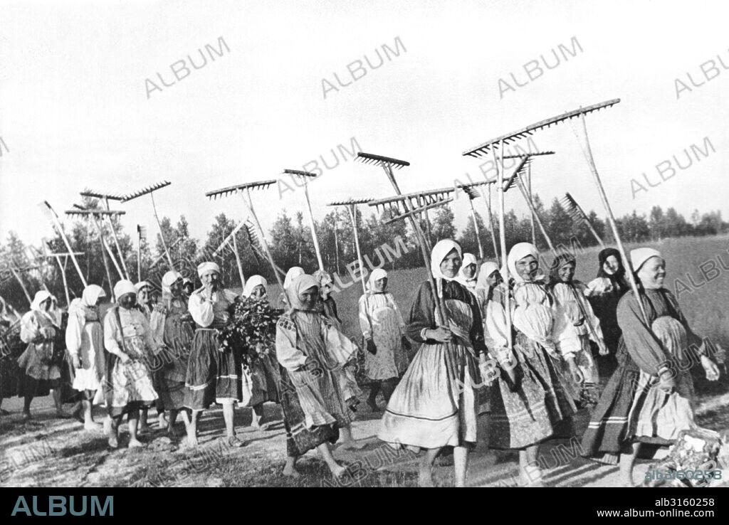 Russia: December 2, 1942 Women members of a Soviet collective farm in the Smolensk region head out to the fields for haymaking afer Germany began pulling troops from the area.