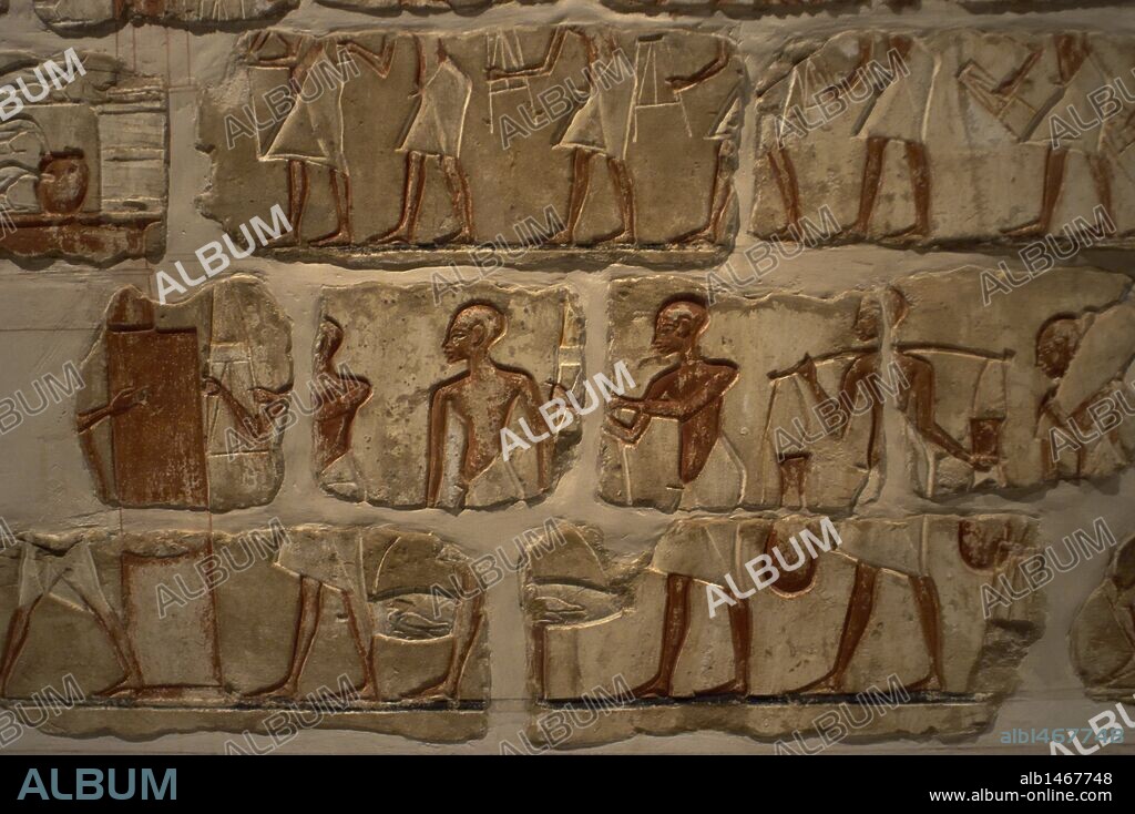 Egyptian art. Talatat walls from the temple of Amenhotep IV. Composed of 283 blocks of polychromed sandstone. Storage of goods in the temple. 18th Dynasty. New Empire. Luxor Museum. Egypt.