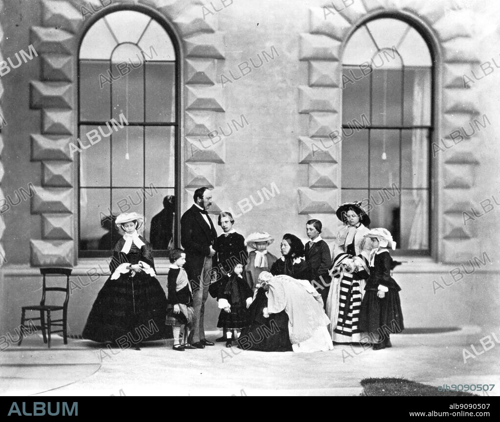 Royal Group at Osbourne 1857 left to right Princess Alice, Prince Arthur, Prince Albert, Prince of Wales, Prince Leopold, Princess Louise, Queen Victoria with Princess Beatrice , Prince Alfred, Princess Royal and Princess Helena.