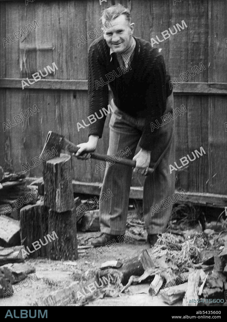 Jack Carroll, welterweight boxing champion, was chopping wood in his backyard at Moonee Ponds when the news was broken to him that the proposed world title fight against Barney Ross was off. October 1, 1936.