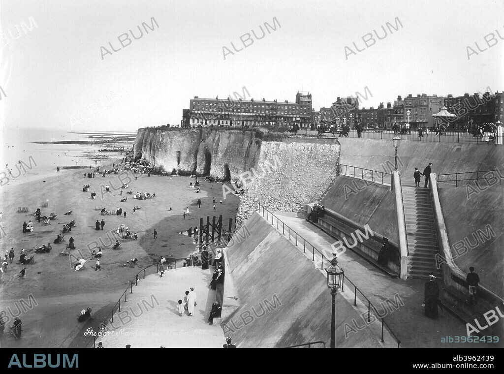 The beach at Margate, Kent, 1890-1910. A view of the fort area of Margate at low tide with holidaymakers on the beach. Margate was one of the first settlements on the Isle of Thanet to be developed into a seaside resort.